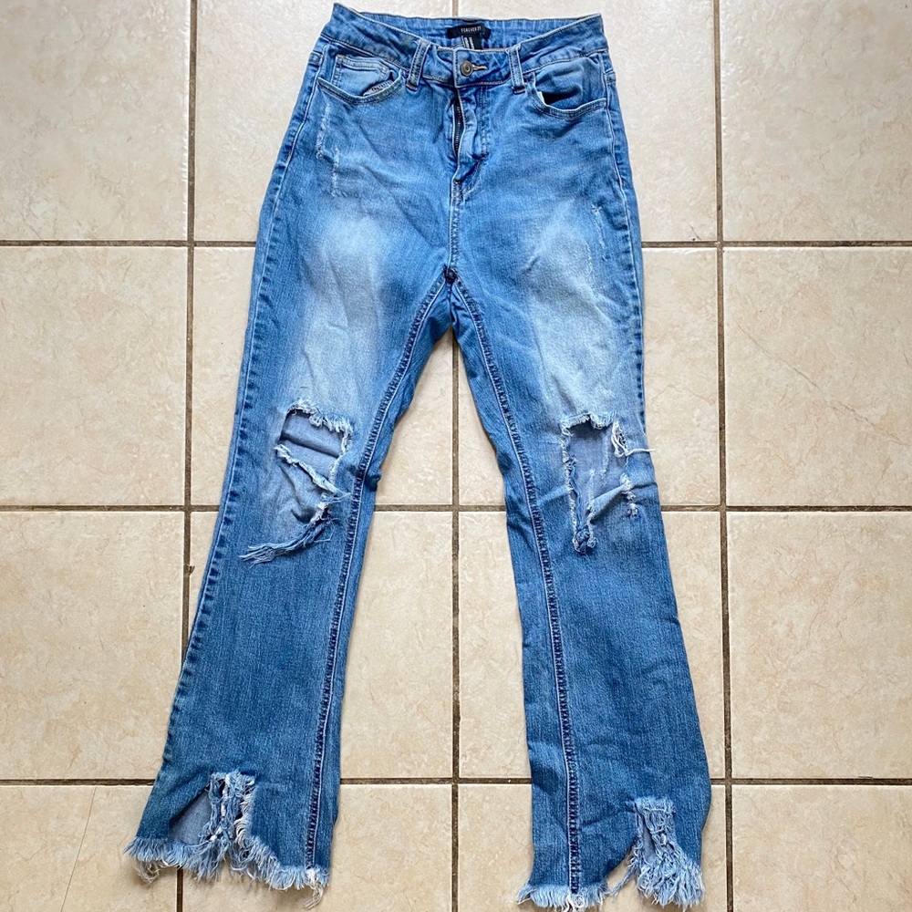 High waisted distressed jeans